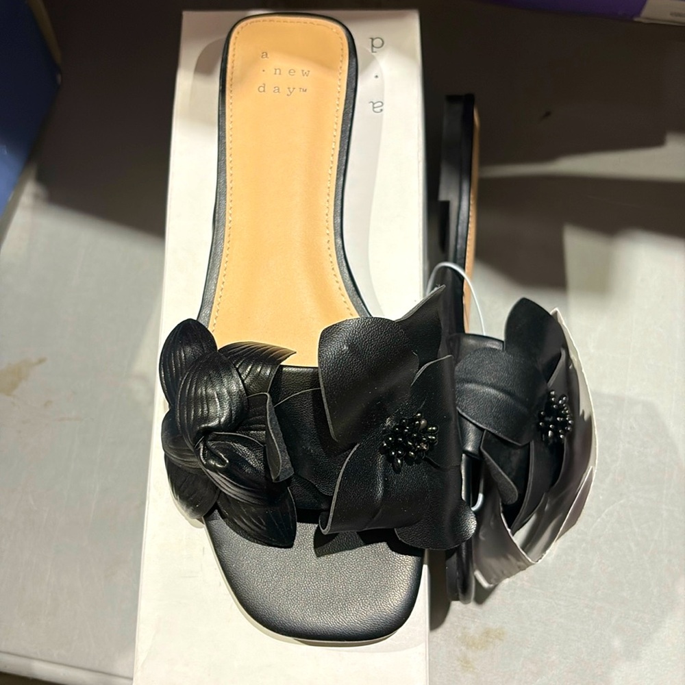 Black flower embellished slides sandals